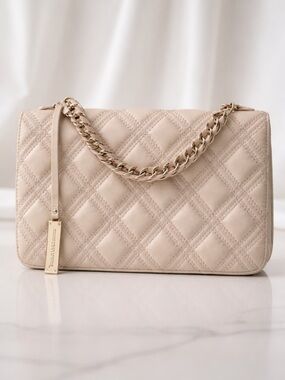 Charles & Keith Small Quilted Vegan Leather Chain Top Handle Bag in Cream
